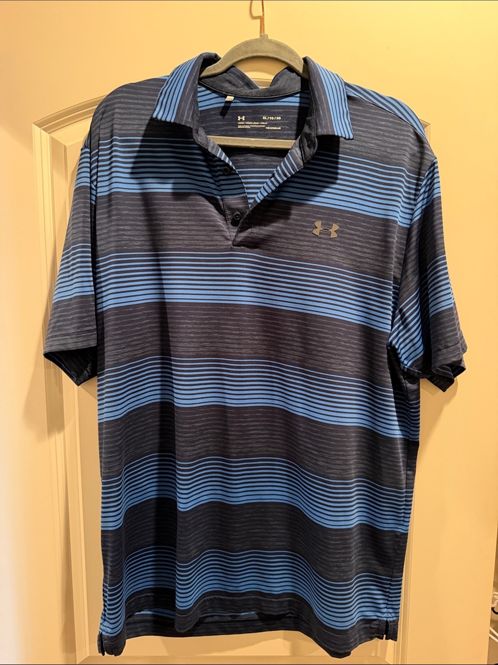 Under Armour Men’s Navy and Blue Horizontal Stripe Polo